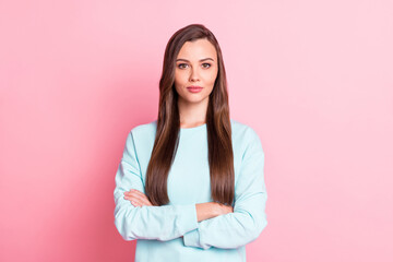 Fototapeta premium Photo of gorgeous attractive young woman folded hands calm face wear blue jumper isolated on pastel pink color background