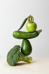 Fresh green vegetables on on the table. Equilibrium floating food balance. Food creative concept, levitation - 427888279