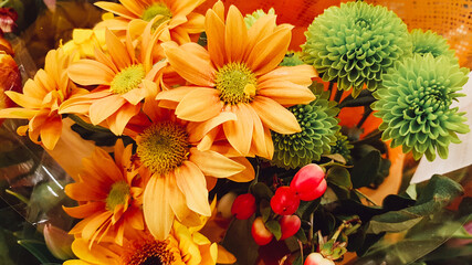 A bouquet of colorful flowers is sold in the shop in honor of the holiday on March 8.