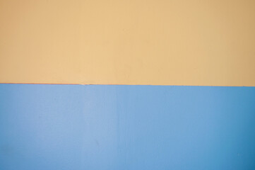 Yellow and blue wall texture for abstract background