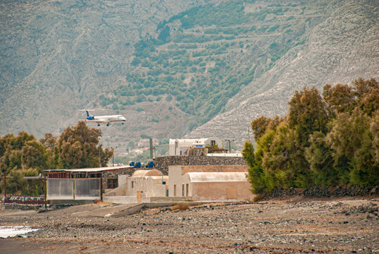 Airplane landing at Santorini airport