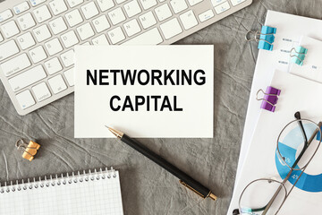 Networking capital is written in a document on the office desk