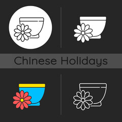Chrysanthemum tea dark theme icon. Double ninth festival. Flower-based infusion drink. Traditional medicine. Linear white, simple glyph and RGB color styles. Isolated vector illustrations