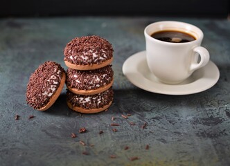 cup of coffee and chocolate cookies
