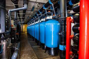 Modern water purification and filtration station. Machine room. Tanks and pipes. Shchuchinsk city, Kazakhstan
