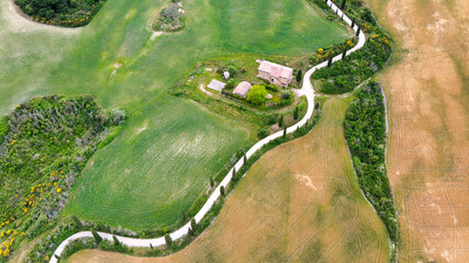 Aerial view of Banfi Castle from drone in Tuscany, spring season