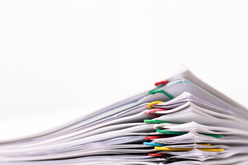 Close-up of Stack Group of report papers Document clipped in color clips.