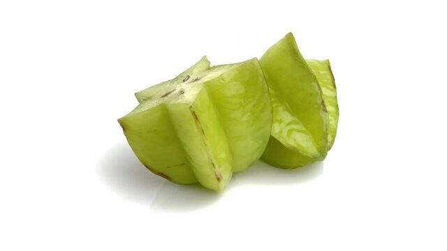 sliced carambola isolated on white background
