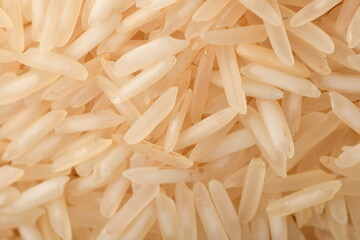 Pile of brown rice isolated on white background.