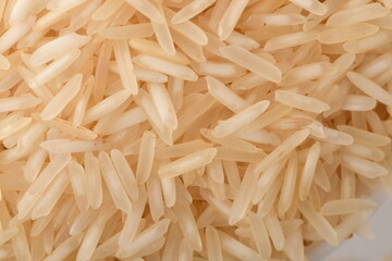 Pile of brown rice isolated on white background.