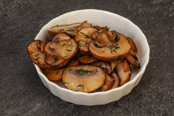 Roasted champignon with herbs and spices