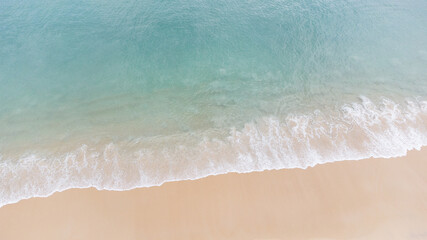 Fototapeta na wymiar top view of beautiful beach and blue water 