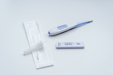 Obraz premium Sars Covid 19 Rapid Antigen Test for Home with Thermometer, Test Negative