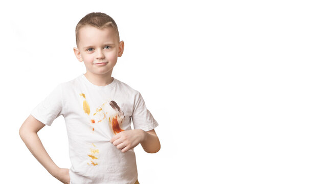 Boy in dirty t-shirt from eating isolated on white background