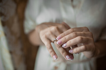 The girl's hand. Wedding ring, hands, rings, decor.