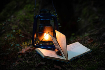 A magic kerosene lamp  and the book in the dark forest