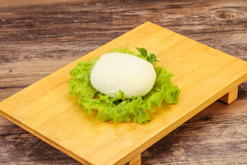 Italian Mozzarella cheese over board