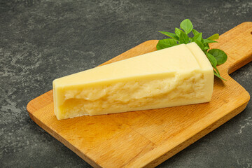 Hard parmesan cheese served basil