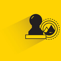 stamp with shadow on yellow background