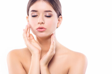 Beautiful girl with closed eyes and perfect skin.Face care. Cosmetology, beauty and spa. Closeup portrait isolated on white background.Concept health and beauty