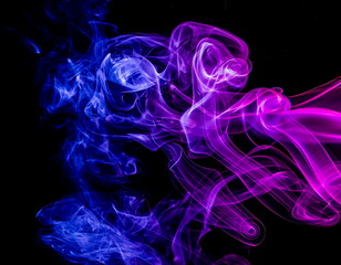 Colored smoke on black background
