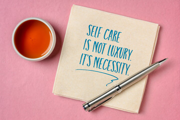 self care is not luxury, it is necessity inspirational reminder - handwriting and doodle on a...