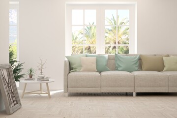 Fototapeta premium White living room with sofa and summer landscape in window. Scandinavian interior design. 3D illustration