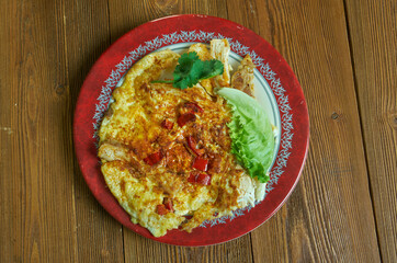 Fried Eggs with Chopped Chinese Toon Leaves