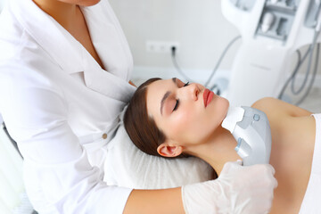 Obraz na płótnie Canvas Woman getting SMAS lifting procedure in beauty clinic