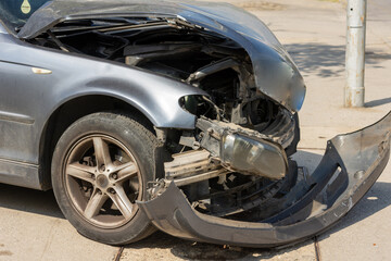 broken car in the street