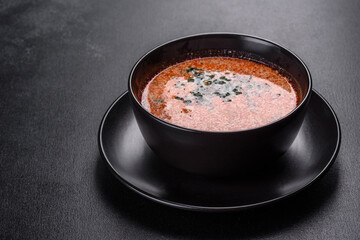Tasty fresh spicy Malaysia soup tom yam with tomato