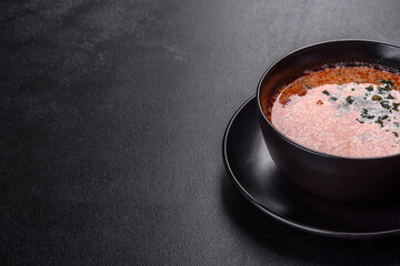 Tasty fresh spicy Malaysia soup tom yam with tomato