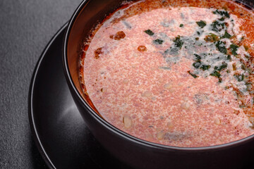 Tasty fresh spicy Malaysia soup tom yam with tomato