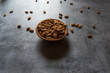 Close up of almonds in a bowl on a background 