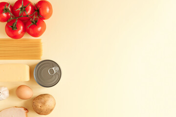 Food set on the light yellow background, copy space.
