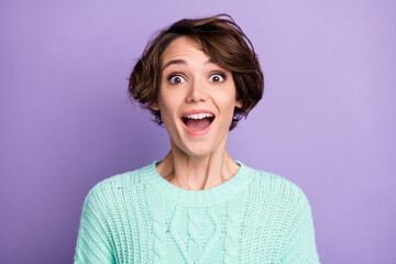 Photo of young excited woman happy positive smile amazed shocked surprised news sale isolated over purple color background