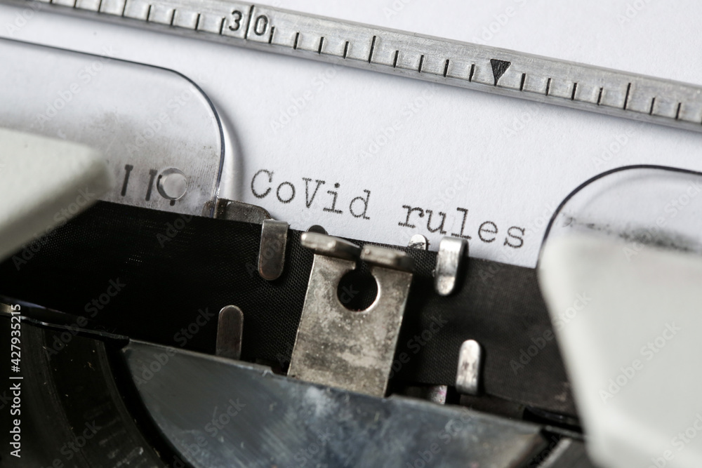 Fototapete covid rules text on blank paper typed on a retro typewriter