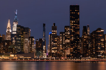 Fototapeta na wymiar Nighttime Midtown Manhattan Skyline along the East River in New York City