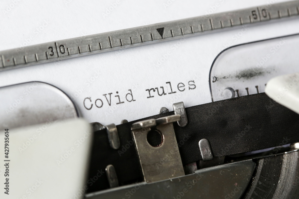 Fototapete covid rules text on blank paper typed on a retro typewriter