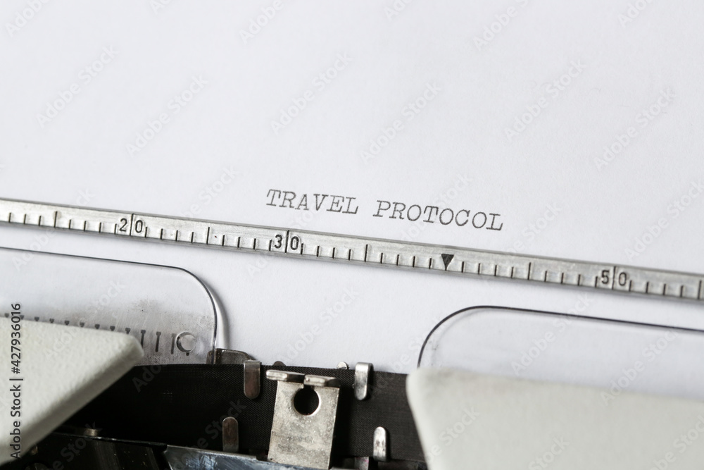 Fototapete travel protocol text on blank paper typed on a vintage typewriter