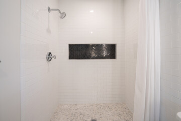American style bathroom has been remodeled with modern fixtures