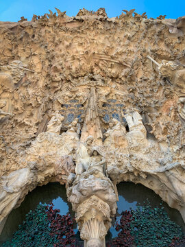 Close Up View Of Sculptures Of The Nativity Facade Of The Sagrada Familia. Architect Antoni Gaudi, Barcelona, Spain