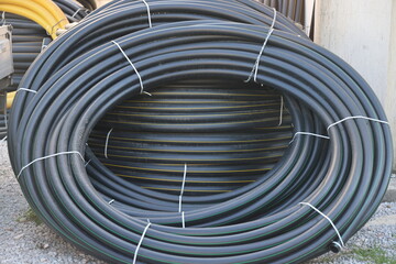 Coiled hoses for sale on a street in a southern city, April 2021