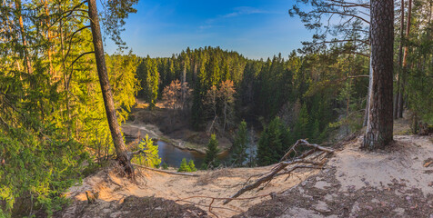 Ula river bend with cliffs and forests in the evening light
