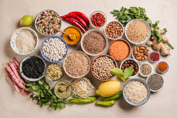 Healthy food background, various legumes, grains and superfoods.