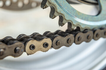 Metal drive chain of a motorcycle, close up shot. 