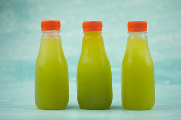 Fresh squeezed sugar cane juice in bottles
