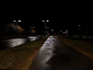 Fototapeta na wymiar night illumination of empty streets in the city