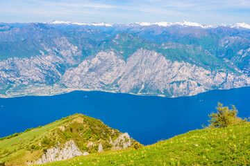 Obraz premium Fragment of a nice mountain view Garda Lake from the trail at Monte Baldo in Italy.