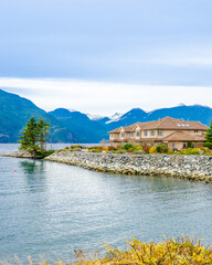 Luxury house with ocean view at overcast day in Vancouver, Canada.